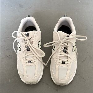 New Balance Off-White and Black Sneakers